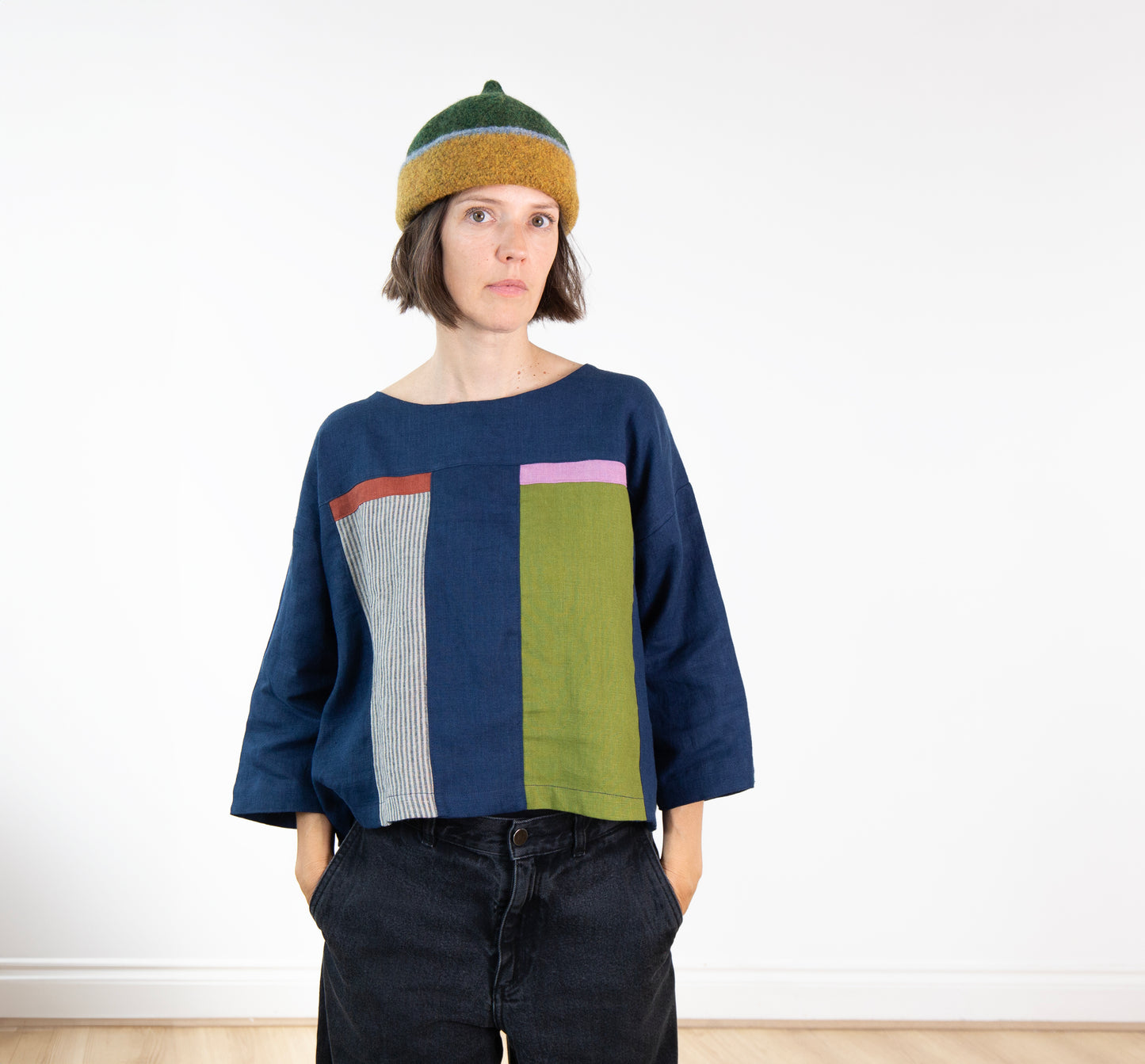 Dark mustard yellow edge and green top woollen hat