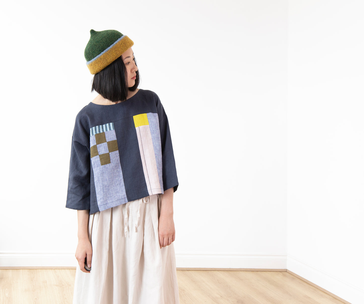 Dark mustard yellow edge and green top woollen hat