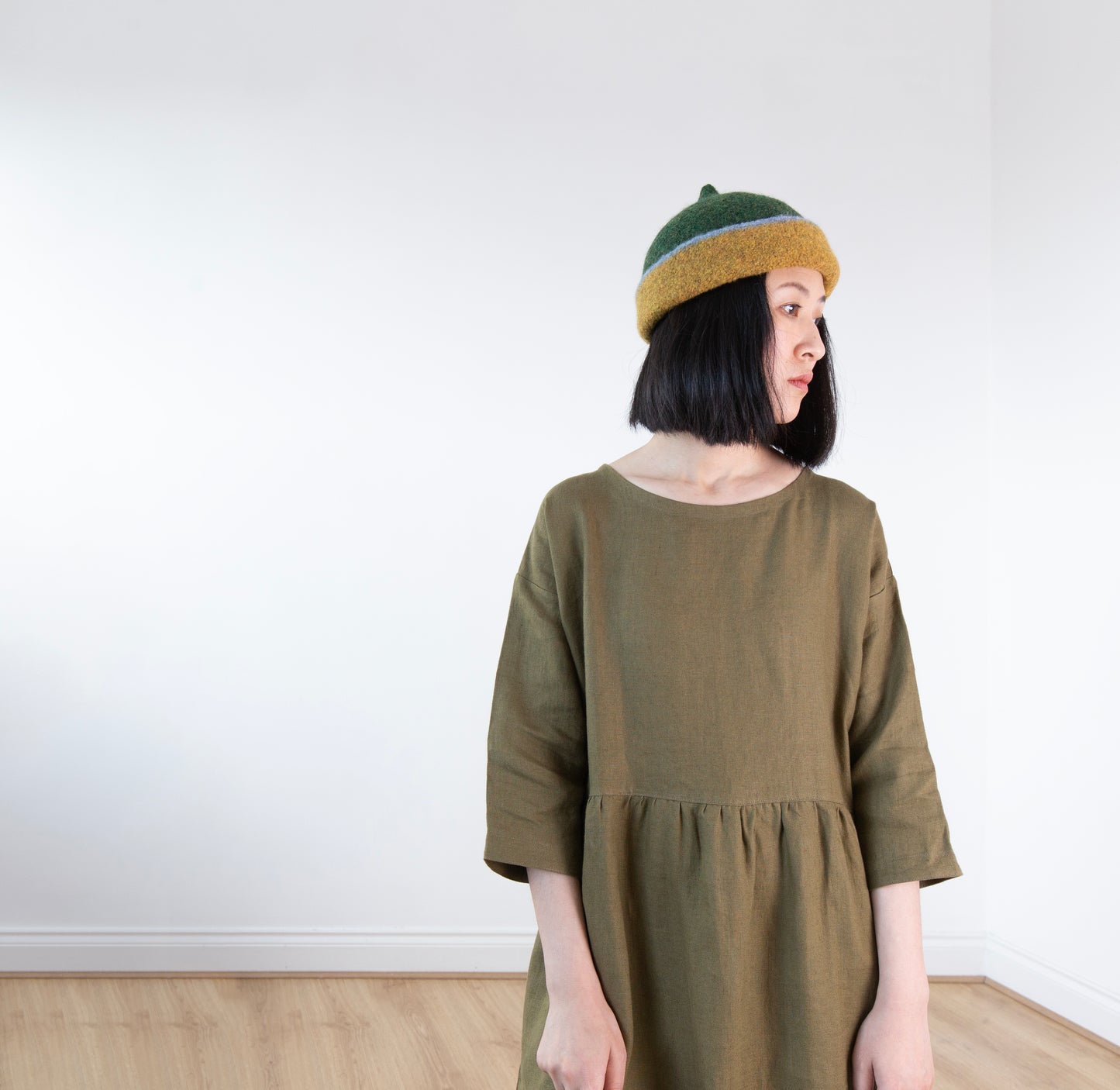 Dark mustard yellow edge and green top woollen hat
