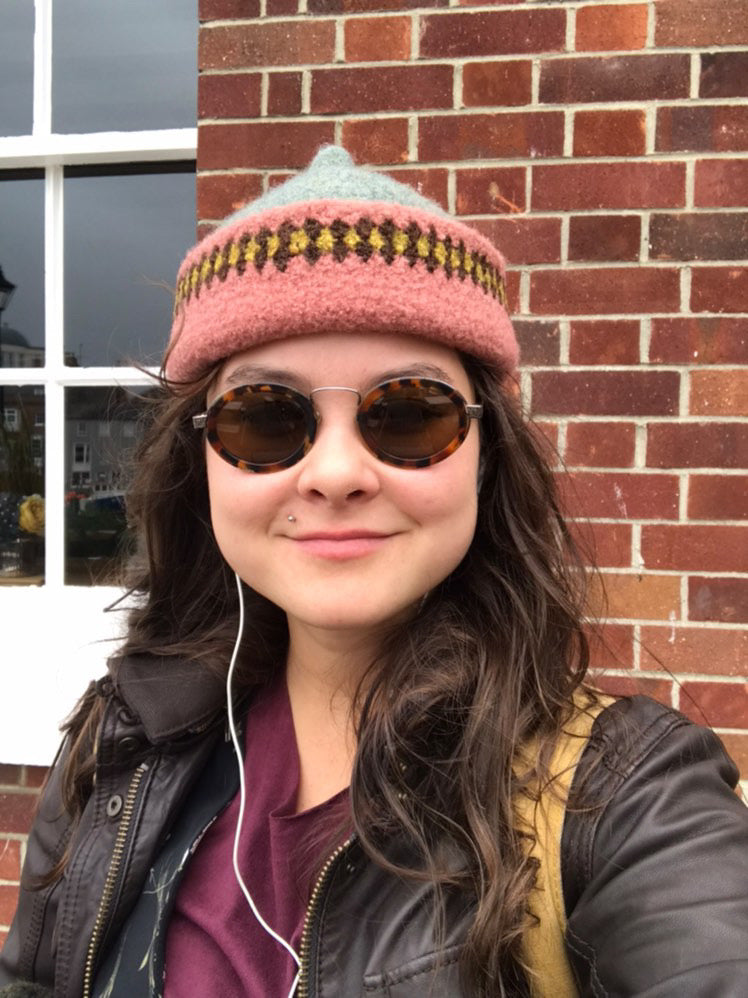 Pink patterned edge and grey top woollen hat