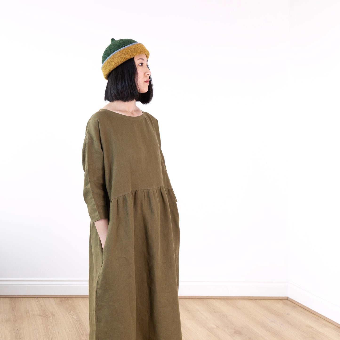 Olive green linen dress, lower-calf length