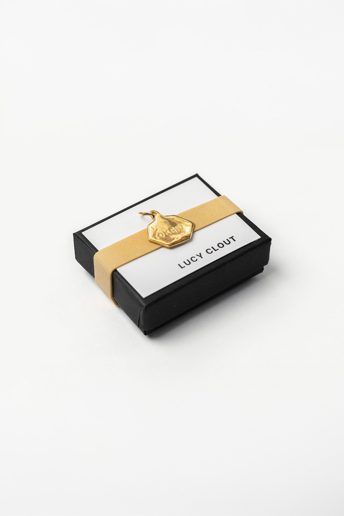 Token Pendants by Lucy Clout (gold-plated silver)