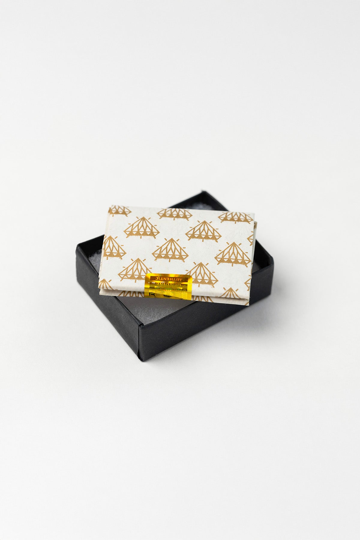Token Pendants by Lucy Clout (gold-plated silver)