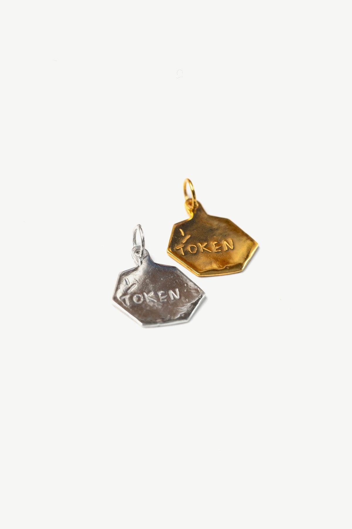 Token Pendants by Lucy Clout (gold-plated silver)