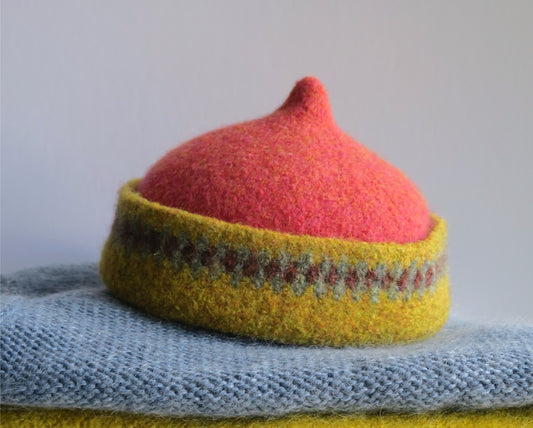 Mustard yellow patterned edge and red top woollen hat