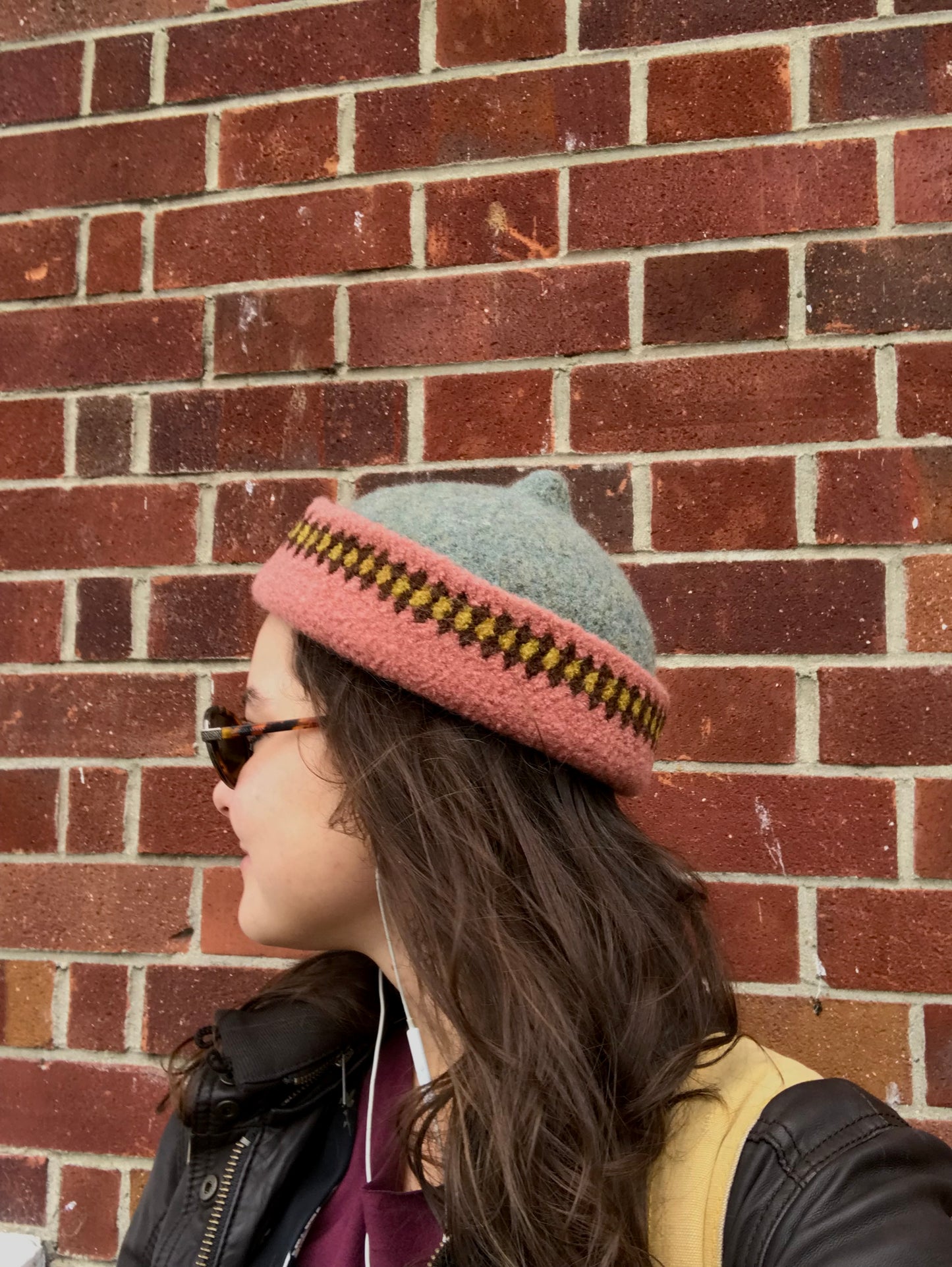 Pink patterned edge and grey top woollen hat